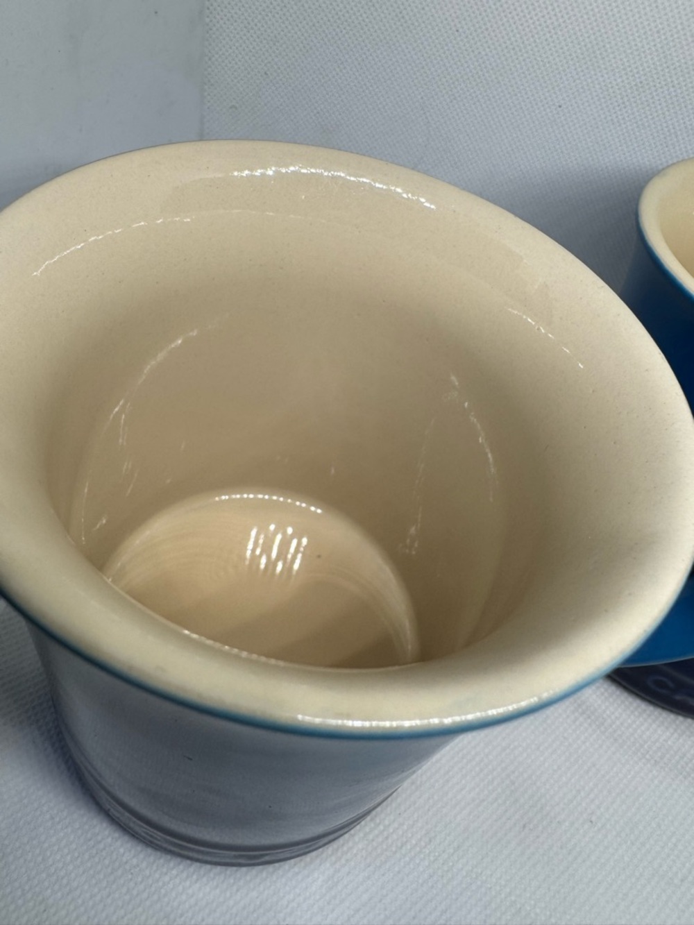 Le Creuset Blue Stoneware Mugs with Cream Interior - Set of 2 - Picture 2 of 6